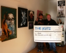 P0G0, gallery owner Chris and winner's cheque